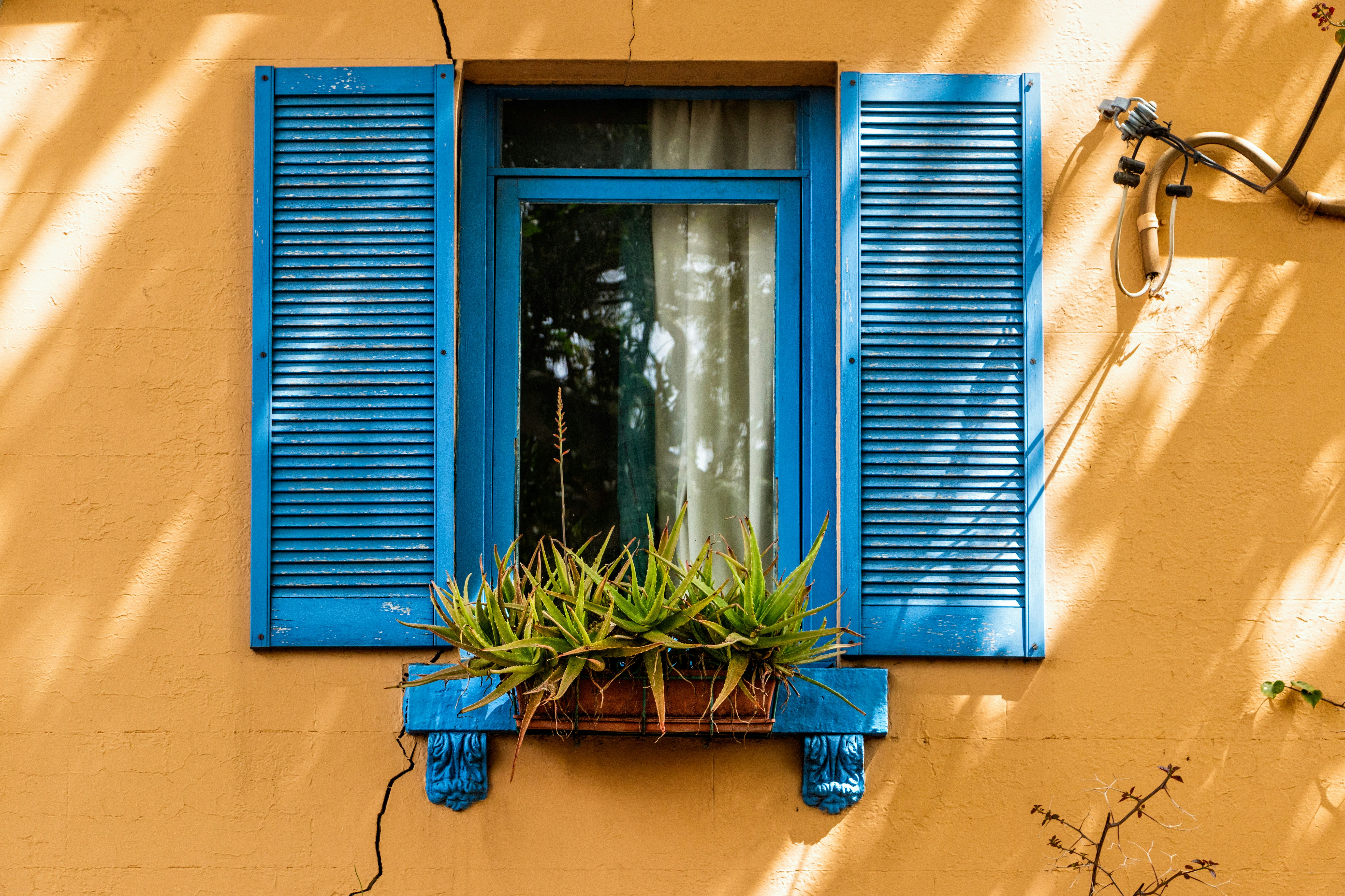 photo of blue open window